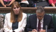 A video grab from footage broadcast by the UK Parliament's Parliamentary Recording Unit (PRU) shows Britain's Prime Minister Keir Starmer sits alongside Britain's Deputy Prime Minister and Levelling Up, Housing and Communities Secretary Angela Rayner during the weekly session of Prime Minister's Questions (PMQs) in the House of Commons in London, on September 3, 2025. (Photo by PRU / AFP)