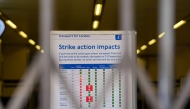 This photo taken on Sept. 8, 2025 shows the locked entrance gate of Baker Street Station on the London Underground with a notices of strike posted inside the station in London, Britain. (Xinhua/Wu Lu)
