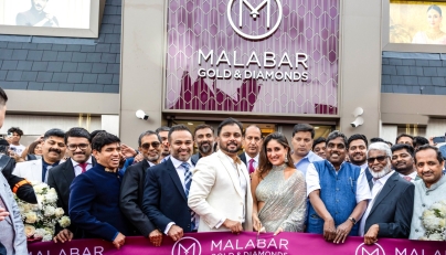 Bollywood actress and brand ambassador of Malabar Gold & Diamonds, Kareena Kapoor Khan with other officials during the inauguration of Birmingham showroom. 