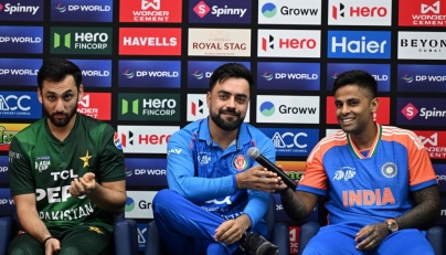 Pakistan cricket team captain Salman Agha (L) Afghanistan team captain Rashid Khan(C) and India captain Surya Kumar Yadhav attend a press conference of the DP World Asia Cup 2025, at Dubai International Cricket Stadium on September 9, 2025. (Photo by Sajjad Hussain / AFP)