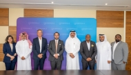 QTerminals and GAC officials pose for a group photo during the agreement signing.