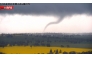 This screengrab from handout surveillance camera footage taken and released by New South Wales Rural Fire Service (NSW RFS) on September 10, 2025 shows a tornado over the countryside near Young in New South Wales. (Photo by Handout / NSW Rural Fire Service (NSW RFS) / AFP) 