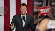 (FILES) Charlie Kirk, Founder and President of Turning Point USA, addresses the crowd at a rally with US Senator and Republican vice presidential candidate JD Vance during a campaign rally at Arizona Christian University Event Center in Glendale, Arizona, on July 31, 2024. (Photo by Laura SEGALL / AFP)
