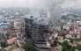 Smoke billows from the burning Hilton Hotels, a day after it was set ablaze by protesters in Kathmandu on September 10, 2025. (Photo by Prabin Ranabhat / AFP)