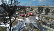 Mexican firefighters extinguish the flames of a gas truck that exploded in Mexico City on September 10, 2025. (Photo by Valentina Alpide / AFP)