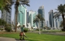 A municipal worker cleans a square in Qatar's capital Doha on September 10, 2025. Photo by Karim JAAFAR / AFP
