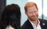 Britain's Prince Harry, Duke of Sussex, reacts as he takes part in a panel discussion on how social action positively impacts mental health, with four young people who are involved with The Diana Award, in central London on September 11, 2025. (Photo by Aaron Chown / POOL / AFP)