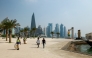 Municipal workers clean Qatar's capital Doha's seaside Corniche on September 10, 2025. (Photo by Karim Jaafar / AFP)