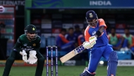 India's captain Suryakumar Yadav plays a shot during the Asia Cup 2025 Twenty20 international cricket match between India and Pakistan at the Dubai International Stadium in Dubai on September 14, 2025. (Photo by Fadel SENNA / AFP)
