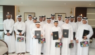 Minister of Environment and Climate Change H E Dr. Abdullah bin Abdulaziz bin Turki Al Subaie with students on the occasion.