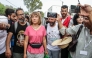 Swedish climate activist Greta Thunberg walks with a crowd of pro-Palestinian activists that arrived to greet the Global Sumud Flottila at the port of the village of Sidi Bou Said on September 7, 2025. Photo by Yassine Mahjoub / AFP