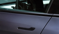 The exterior handle of a 2023 Tesla Model Y. Photo credit: Sarah Anne Ward/Bloomberg
