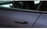 The exterior handle of a 2023 Tesla Model Y. Photo credit: Sarah Anne Ward/Bloomberg
