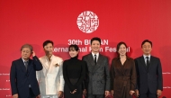 (L-R) South Korean director Park Chan-wook, actors Lee Byung-hun, Son Ye-jin, Park Hee-soon, Lee Sung-min and Yeom Hye-ran pose for a photo after a press conference for the opening film 'No Other Choice' of the 30th Busan International Film Festival (BIFF) at the Busan Cinema Center in Busan on September 17, 2025. (Photo by Jung Yeon-je / AFP)