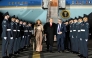US President Donald Trump (C) and US First Lady Melania Trump disembark from Air Force One after landing at Stansted Airport, eastern England, on September 16, 2025. (Photo by Andrew Caballero-Reynolds / AFP)