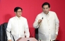 This photo taken on July 28, 2025 shows Philippine President Ferdinand Marcos (left) listening to Speaker of the House Martin Romualdez in the upper rostrum during the State of the Nation Address at the House of Representatives in Manila. (Photo by Ted Aljibe / AFP)
