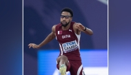 Qatar’s athlete Abderrahman Samba competes in the men’s 400m hurdles semi-finals.