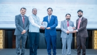 Officials pose for a group photo during the seminar.
