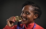 Gold medallist in the women's 1500m final Kenya's athlete Faith Kipyegon poses for portraits during a studio photo session on the sidelines of the World Athletics Championships in Tokyo on September 17, 2025. (Photo by Andrej Isakovic / AFP)