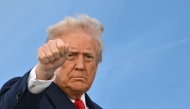 US President Donald Trump as he board Air Force One at Stansted Airport, in Stansted, north of London, on September 18, 2025, to leave at the end of the US President's second State Visit. (Photo by Andrew Caballero-Reynolds / AFP)
