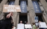 Demonstrators protest the suspension of the 