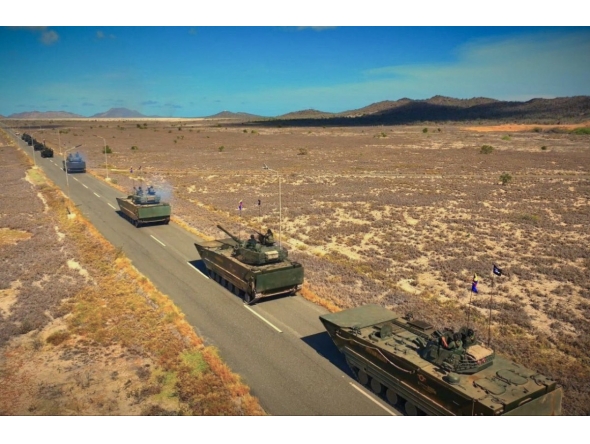 This handout picture released on September 18, 2025, by the CEOFANB (Strategic Operations Command of the Bolivarian National Armed Forces of Venezuela) shows a Venezuelan Navy VN16 tanks during military exercises on the Caribbean island of La Orchila, Venezuela. (Photo by Handout / CEOFANB / AFP)
