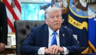 US President Donald Trump speaks before signing executive orders in the Oval Office at the White House in Washington, DC, on September 19, 2025. (Photo by Mandel Ngan/ AFP)