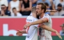 Bayern Munich's English forward #09 Harry Kane (R) celebrates with team mate Bayern Munich's Austrian midfielder #27 Konrad Laimer after scoring his team's third goal during the German first division Bundesliga football match between TSG 1899 Hoffenheim and FC Bayern Munich in Sinsheim, southwestern Germany on September 20, 2025. (Photo by Daniel ROLAND / AFP)