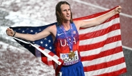 US' athlete Cole Hocker celebrates winning the men's 5000m final during the World Athletics Championships in Tokyo. (Photo by Philip Fong / AFP)