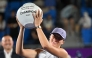 Iga Swiatek of Poland celebrates with the trophy after beating Ekaterina Alexandrova of Russia to win the women's singles final match at the Korea Open tennis tournament in Seoul on September 21, 2025. (Photo by Jung Yeon-je / AFP)