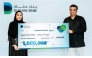 Dukhan Bank official with Thara'a grand prize winner.