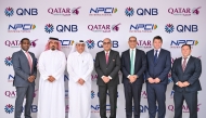 Indian Ambassador to Qatar H E Vipul with senior executives from QNB Group and Qatar Airways Group during the event.