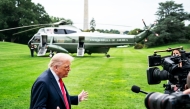 US President Donald Trump speaks with the press at the White House. (Photo by Demetrius Freeman/The Washington Post)
