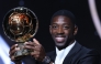 Paris Saint-Germain's French forward Ousmane Dembele reacts receiving the Ballon d'Or award during the 2025 Ballon d'Or France Football award ceremony at the Theatre du Chatelet in Paris on September 22, 2025. (Photo by Franck FIFE / AFP)
