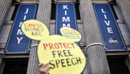A demonstrator waves a 