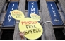A demonstrator waves a 