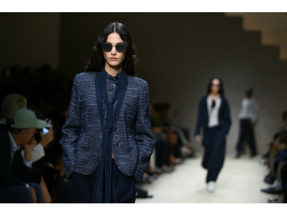 A model walks the runway during the Emporio Armani collection show at Milan's Fashion Week Womenswear Spring / Summer 2026, on September 25, 2025 in Milan. (Photo by Marco Bertorello / AFP)

