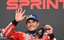 Ducati Lenovo Team's Spanish MotoGP rider Marc Marquez celebrates on the podium after finishing in second place during the MotoGP sprint race. (Photo by Toshifumi Kitamura / AFP)
