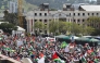 Protesters gather at the South African Parliament during civil society and faith-based organizations’ mass rally for Gaza, in Cape Town on September 27, 2025. (Photo by RODGER BOSCH / AFP)