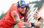 Ducati Lenovo Team's Spanish MotoGP rider Marc Marquez celebrates with the trophy after the MotoGP class race of the MotoGP Japanese Grand Prix at the Mobility Resort Motegi on September 28, 2025. (Photo by Toshifumi Kitamura / AFP)