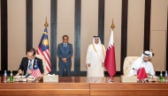 Deputy Prime Minister and Minister of State for Defense Affairs H E Sheikh Saoud bin Abdulrahman bin Hassan Al-Thani and Minister of Defence of Malaysia H E Mohamed Khaled Nordin attend the agreement signing in Doha yesterday. 
