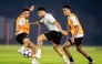 Al Sadd's Paulo Otávio (centre) trains with teammates.