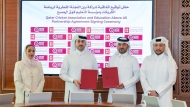 Education Above All Foundation and  Qatar Cricket Association officials during the signing of the agreement.
