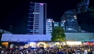 Call center employees gather outside their office building after earthquake tremors at Cebu in central Philippines on September 30, 2025. (Photo by Alan Tangcawan / AFP)
