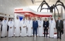 President and General Manager for ExxonMobil Qatar, Taher Hamid, with other officials during the conference.
