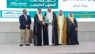 QRCS officials receiving the award at GCC Humanitarian Summit 2025 in Manama, Bahrain.
