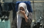 A relative of a missing student mourns as rescuers search for survivors at the Al Khoziny Islamic boarding school in Sidoarjo, East Java province on October 2, 2025. (Photo by Juni Kriswanto / AFP)
 