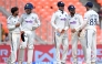 India's players celebrate their win in the first Test cricket match against West Indies at the Narendra Modi Stadium in Ahmedabad on October 4, 2025. (Photo by R.Satish Babu / AFP) 
