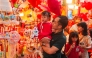 People shop for the Mid-Autumn Festival at Hang Ma Street in Hanoi, Vietnam, Oct. 3, 2025. Hanoi's Hang Ma Street is brightly decorated with lanterns and festive items for the upcoming Mid-Autumn Festival. (Photo by Dang Hong Dung/Xinhua)