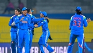India's players celebrate after the dismissal of Pakistan's Muneeba Ali during the ICC Women's Cricket World Cup 2025 one-day international (ODI) match between India and Pakistan at the R. Premadasa International Cricket Stadium in Colombo on October 5, 2025. (Photo by Ishara S Kodikara / AFP)
